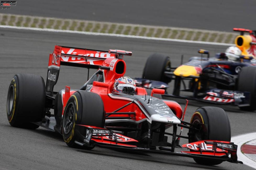 Timo Glock (Marussia-Virgin) und Sebastian Vettel (Red Bull) 