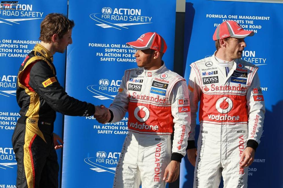 Romain Grosjean (Lotus), Lewis Hamilton (McLaren) und Jenson Button (McLaren) 