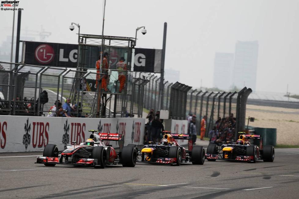 Lewis Hamilton (McLaren), Sebastian Vettel (Red Bull) und Mark Webber (Red Bull) 