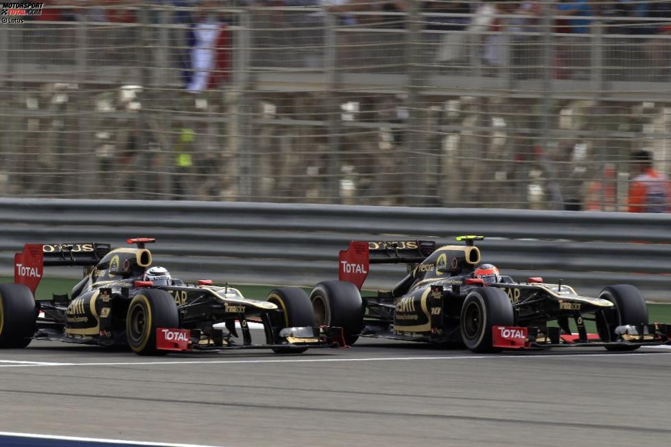 Kimi Räikkönen (Lotus) Romain Grosjean (Lotus) 