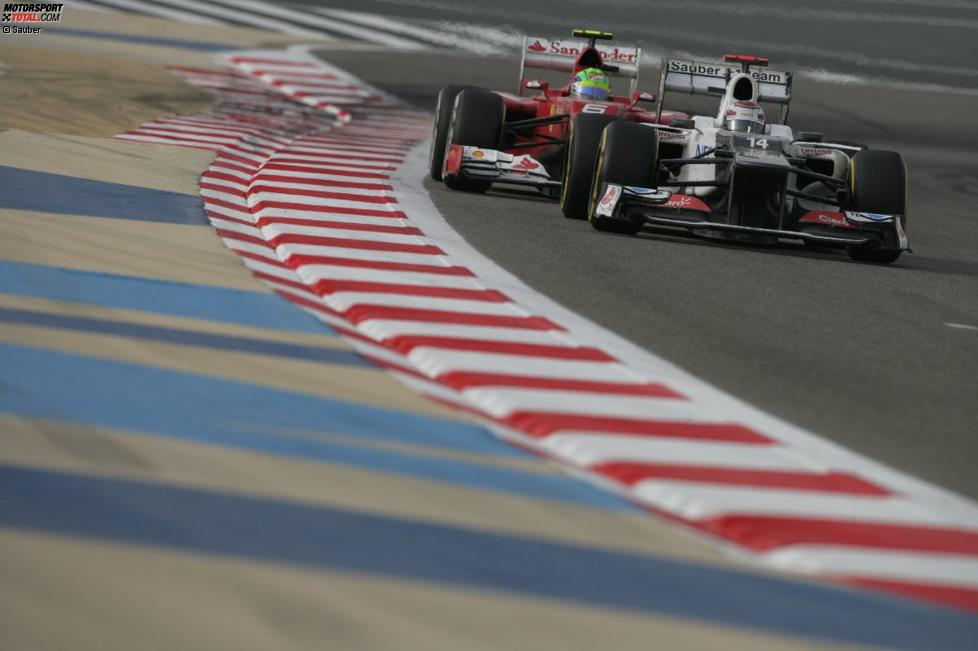 Kamui Kobayashi (Sauber) Felipe Massa (Ferrari)