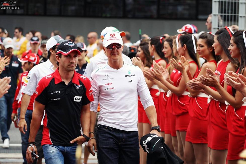 Timo Glock (Marussia) und Michael Schumacher (Mercedes) 
