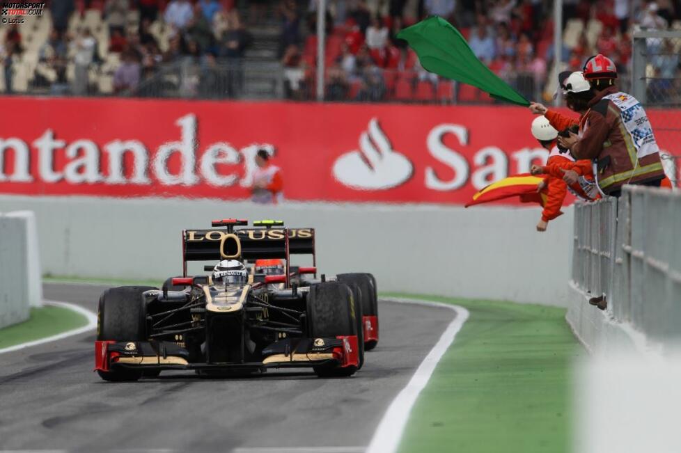 Kimi Räikkönen (Lotus) und Romain Grosjean (Lotus) 