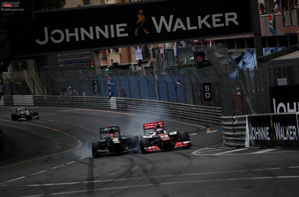Heikki Kovalainen (Caterham) und Jenson Button (McLaren) 