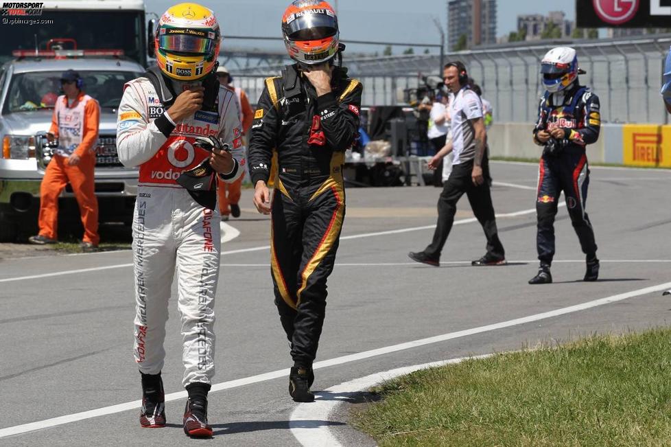 Lewis Hamilton (McLaren), Romain Grosjean (Lotus) und Sebastian Vettel (Red Bull) 