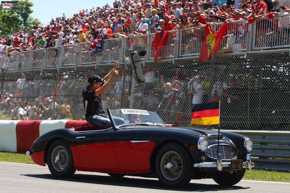 Sebastian Vettel (Red Bull) bei der Paraderunde vor dem Rennen in Montreal.
