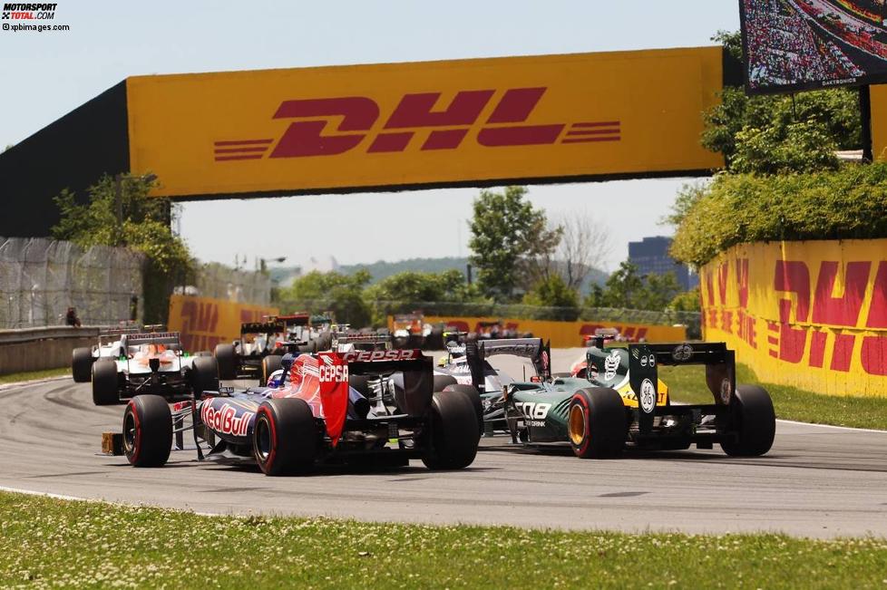 Das hintere Ende des Feldes: Daniel Ricciardo (Toro Rosso) und Heikki Kovalainen (Caterham) 
