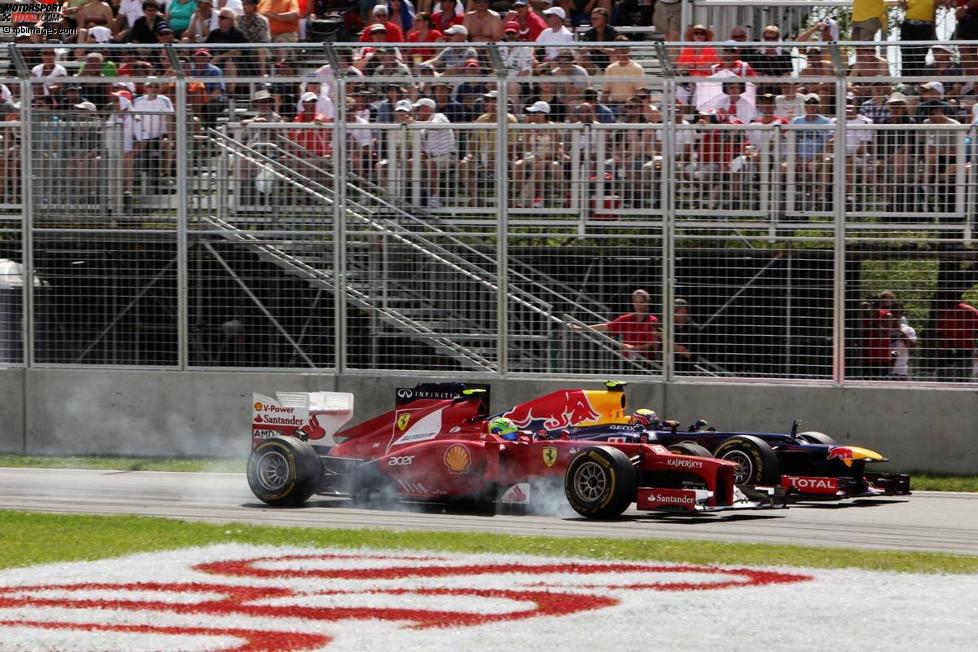 Duell zwischen Mark Webber (Red Bull) und Felipe Massa (Ferrari) in der Haarnadelkurve