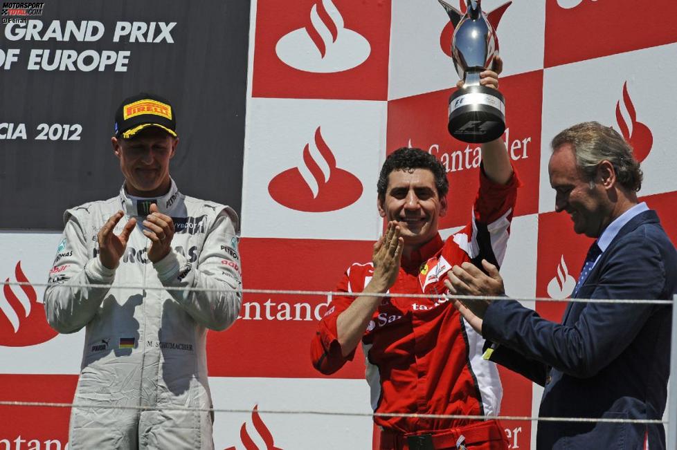 Michael Schumacher (Mercedes) und Andrea Stella (Ferrari)
