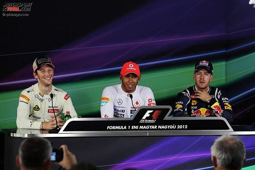 Romain Grosjean (Lotus), Lewis Hamilton (McLaren) und Sebastian Vettel (Red Bull) 