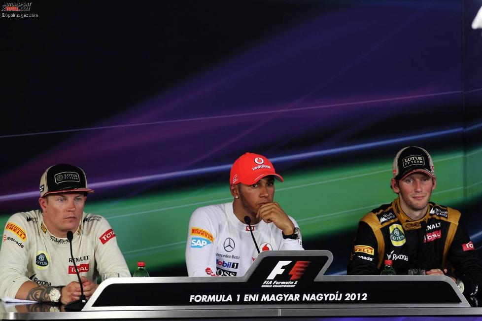 Lewis Hamilton (McLaren), Romain Grosjean (Lotus) und Kimi Räikkönen (Lotus) 