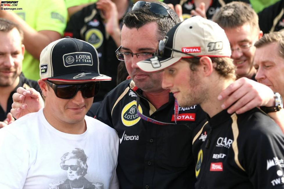 Eric Boullier (Lotus-Teamchef), Kimi Räikkönen (Lotus) und Romain Grosjean (Lotus) 