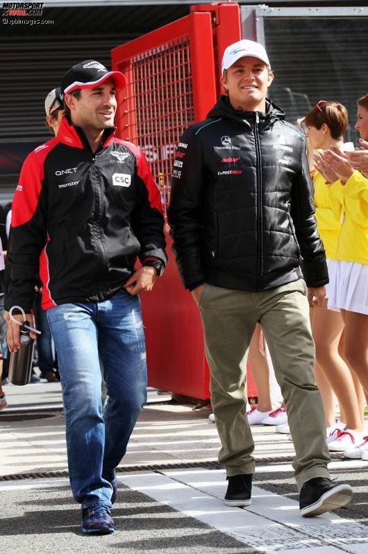 Timo Glock (Marussia) und Nico Rosberg (Mercedes) 