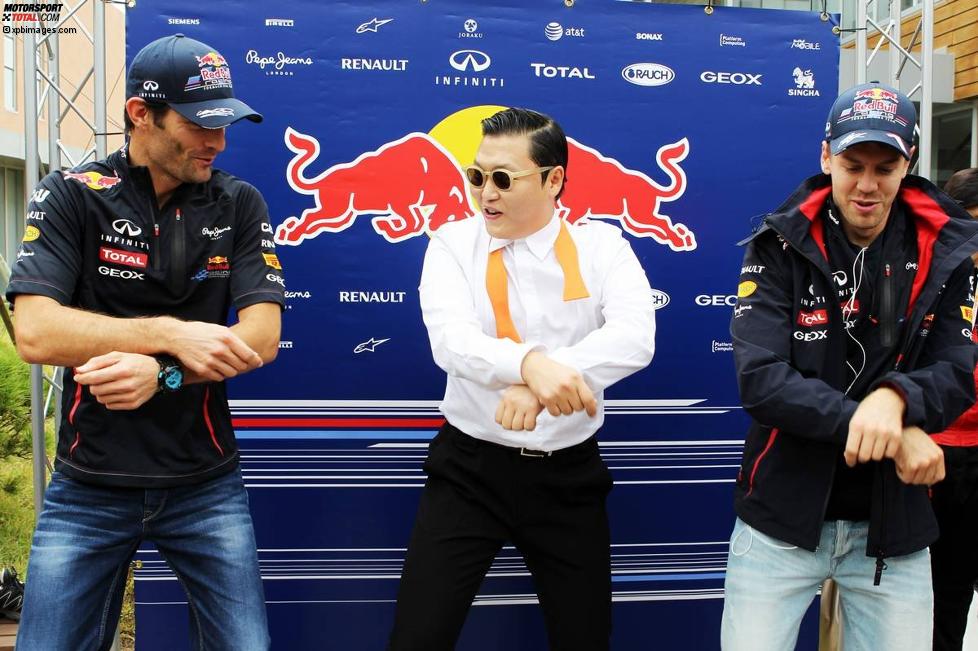 Mark Webber und Sebastian Vettel mit Rapper Psy beim Gangnam Style