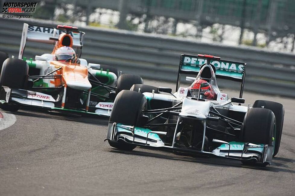 Michael Schumacher (Mercedes) und Paul di Resta (Force India) 