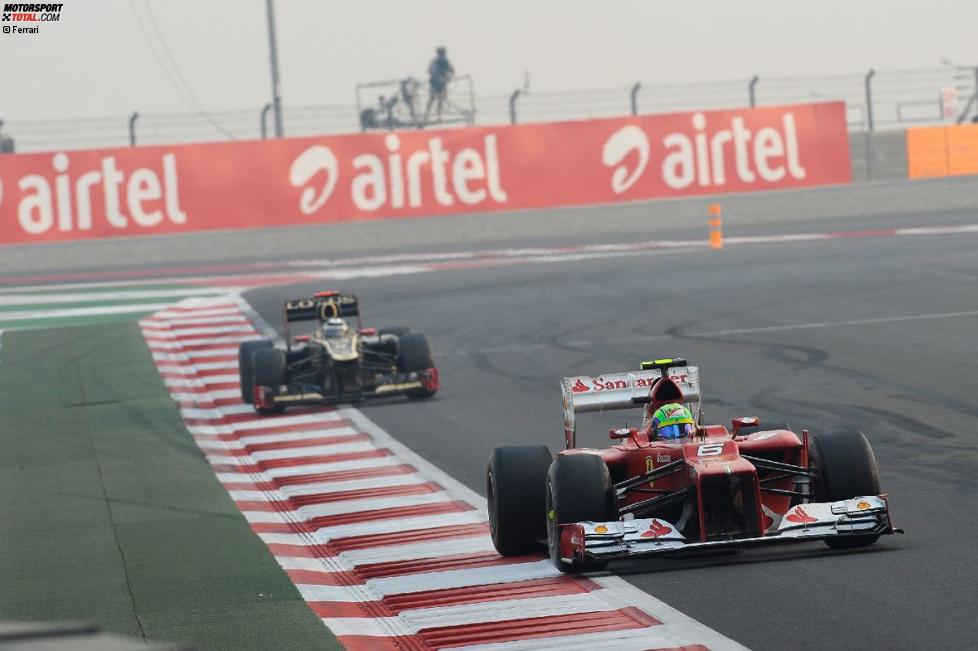 Felipe Massa (Ferrari) vor und Kimi Räikkönen (Lotus) 