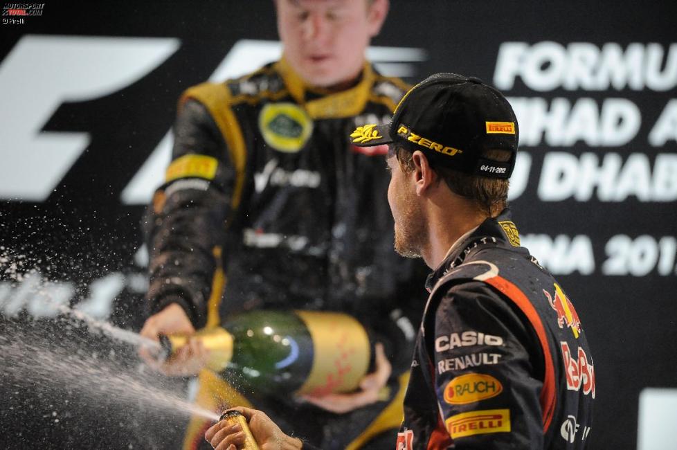 Kimi Räikkönen (Lotus) und Sebastian Vettel (Red Bull) 