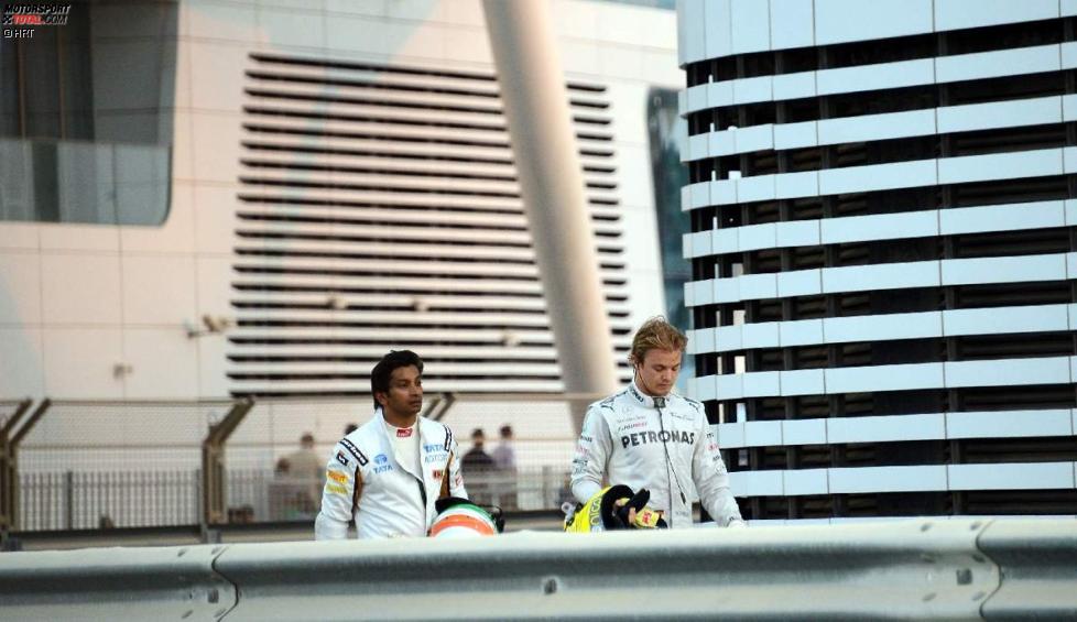 Narain Karthikeyan (HRT) und Nico Rosberg (Mercedes) 