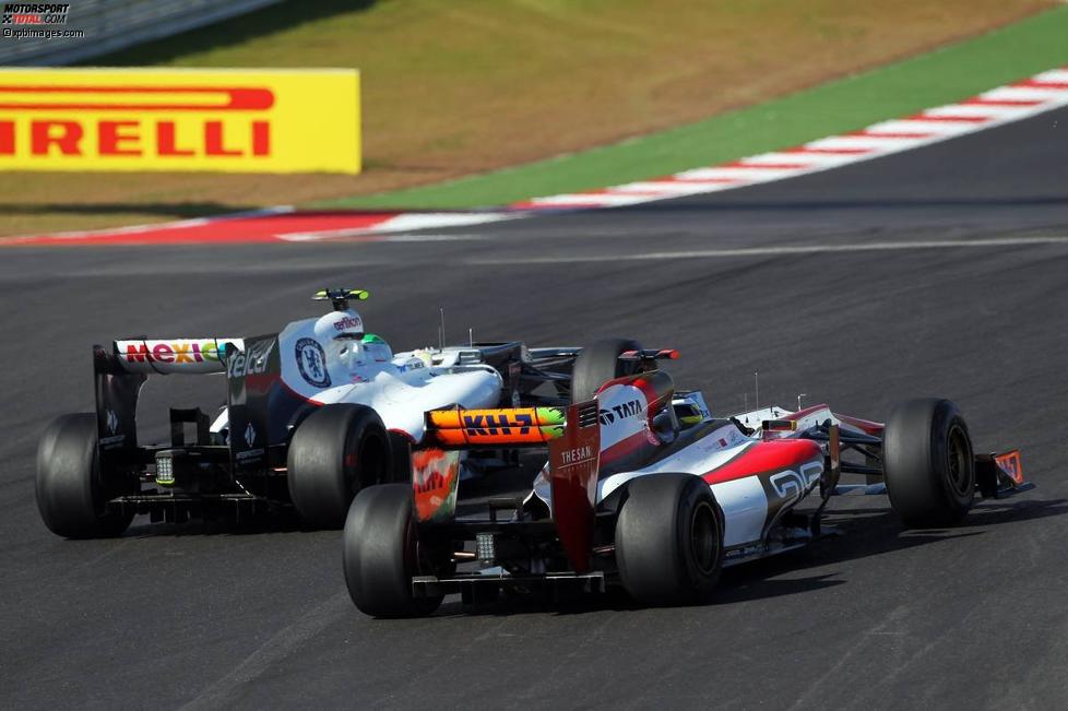Sergio Perez (Sauber) und Pedro de la Rosa (HRT) 