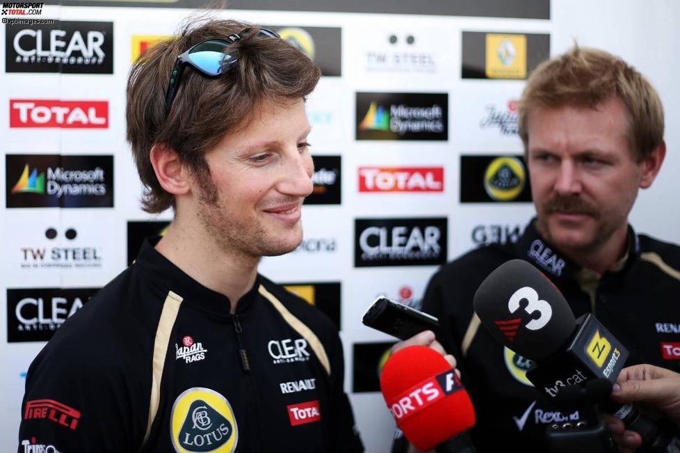 Romain Grosjean (Lotus) und Pressesprecher Andy Stobart