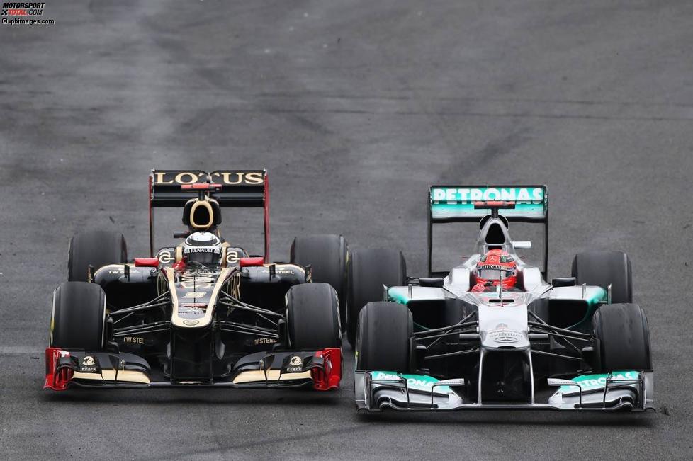 Michael Schumacher (Mercedes) und Kimi Räikkönen (Lotus) 