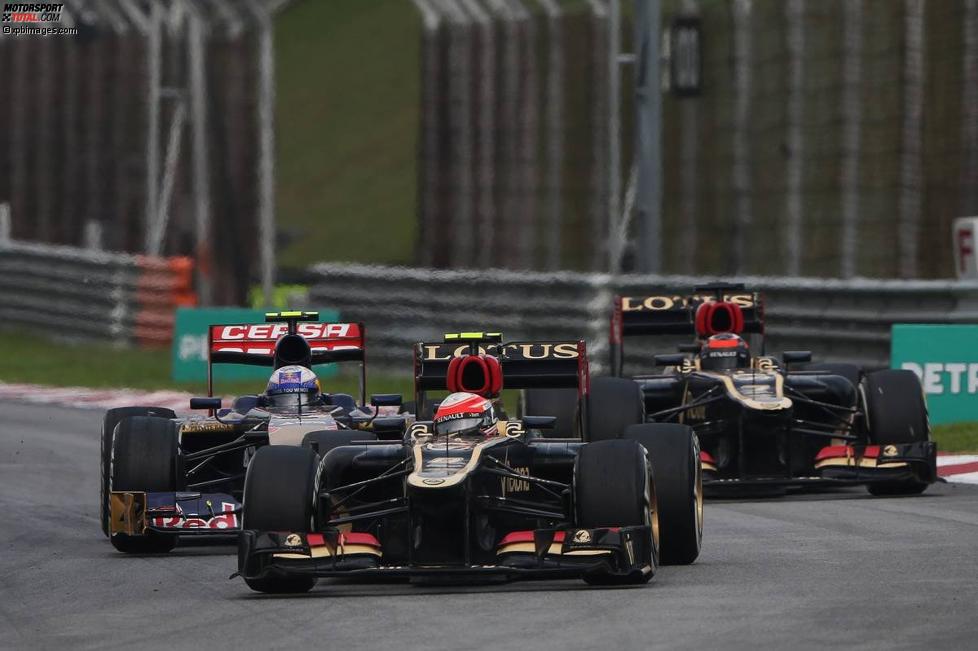 Romain Grosjean (Lotus), Daniel Ricciardo (Toro Rosso) und Kimi Räikkönen (Lotus) 