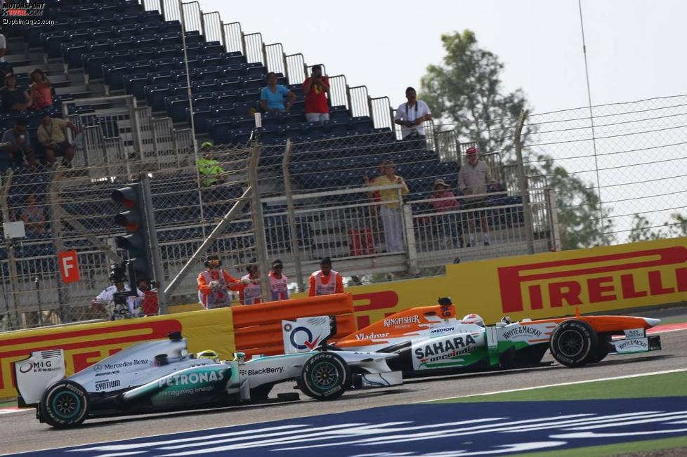 Paul di Resta (Force India) und Nico Rosberg (Mercedes) 