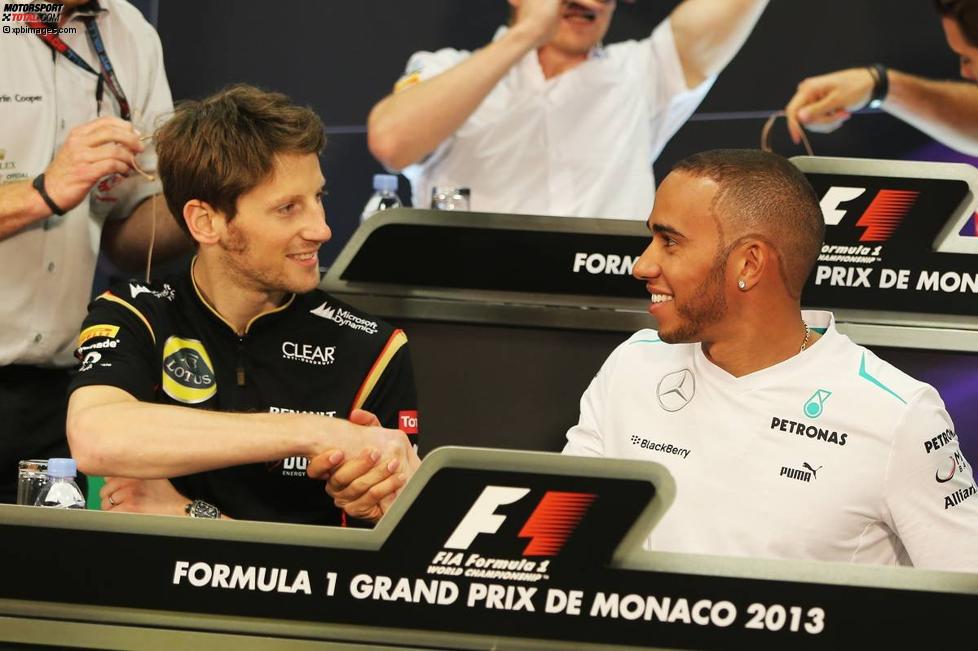 Romain Grosjean (Lotus) und Lewis Hamilton (Mercedes) 