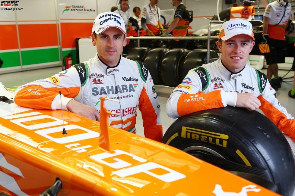 Adrian Sutil (Force India) und Paul di Resta (Force India) stehen vor dem 100. Grand Prix ihres Teams