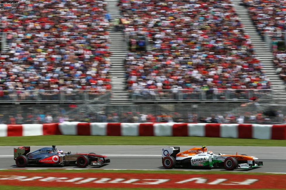 Adrian Sutil (Force India) und Jenson Button (McLaren) 
