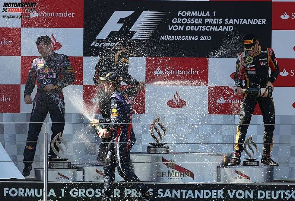 Kimi Räikkönen (Lotus), Sebastian Vettel (Red Bull) und Romain Grosjean (Lotus) 