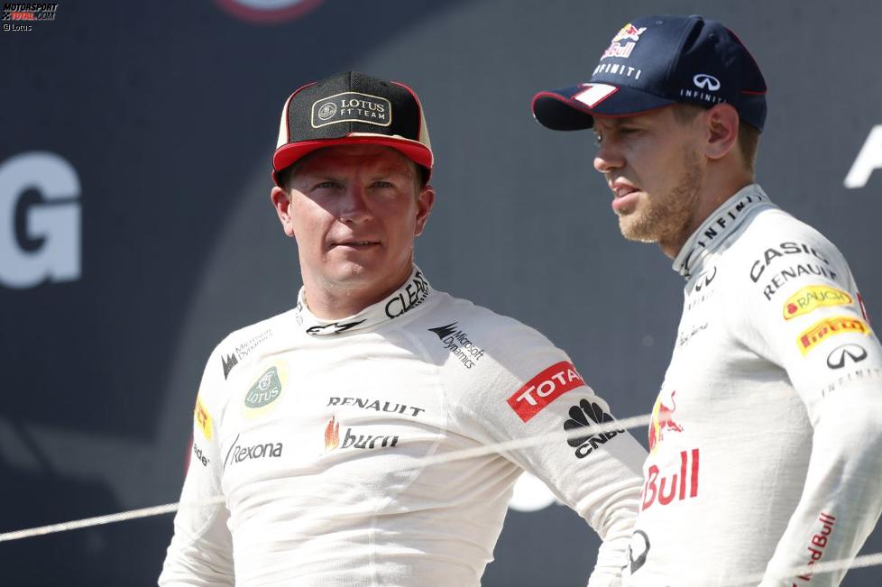 Kimi Räikkönen (Lotus) und Sebastian Vettel (Red Bull) 