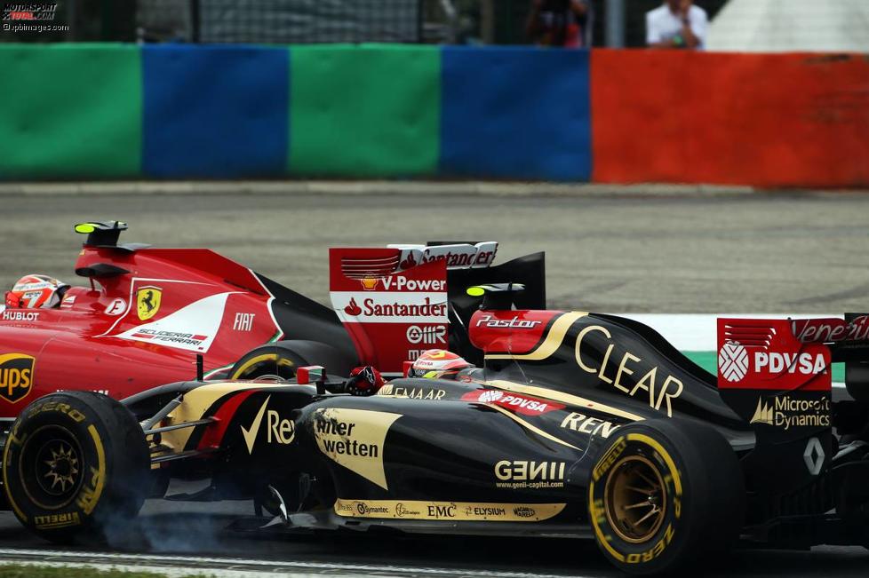 Pastor Maldonado (Lotus) und Kimi Räikkönen (Ferrari) 