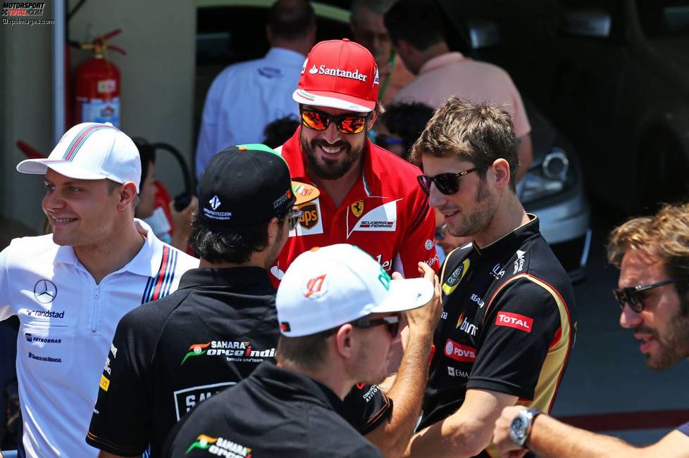 Fernando Alonso (Ferrari), Sergio Perez (Force India) und Romain Grosjean (Lotus) 