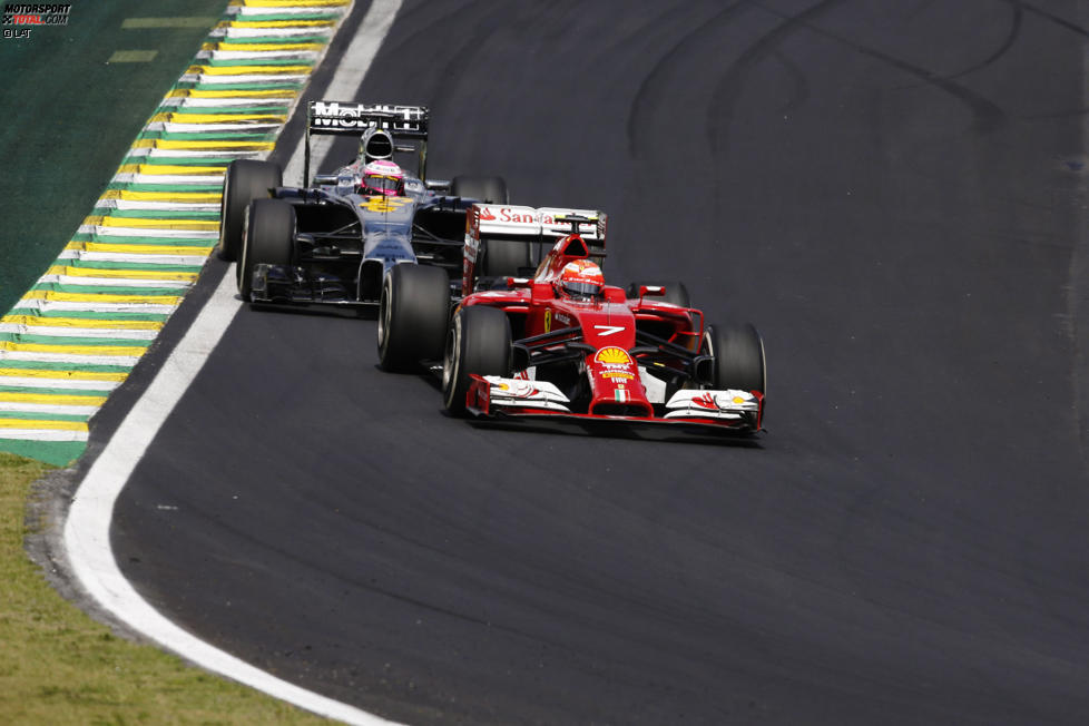 Kimi Räikkönen (Ferrari) und Jenson Button (McLaren) 