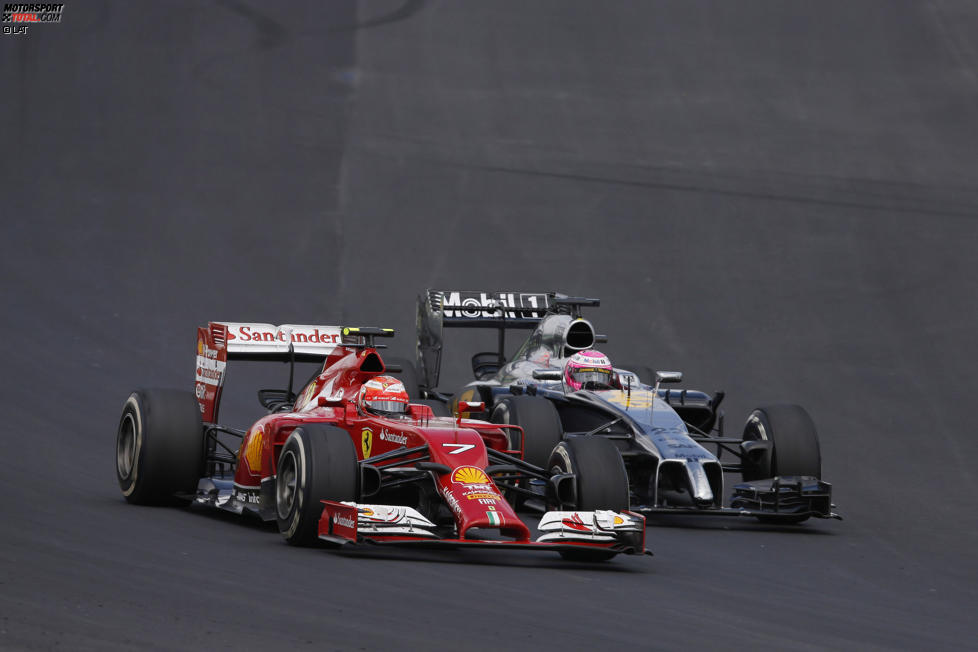 Kimi Räikkönen (Ferrari) und Jenson Button (McLaren) 