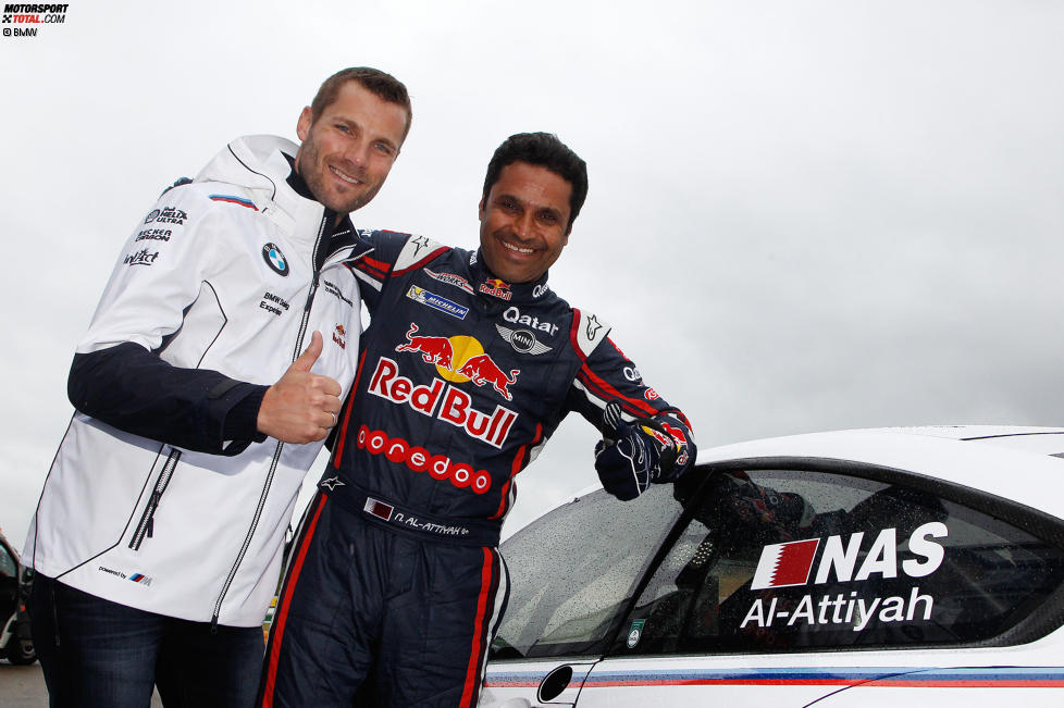 Martin Tomczyk (Schnitzer-BMW) und Nasser Al-Attiyah (Mini)
