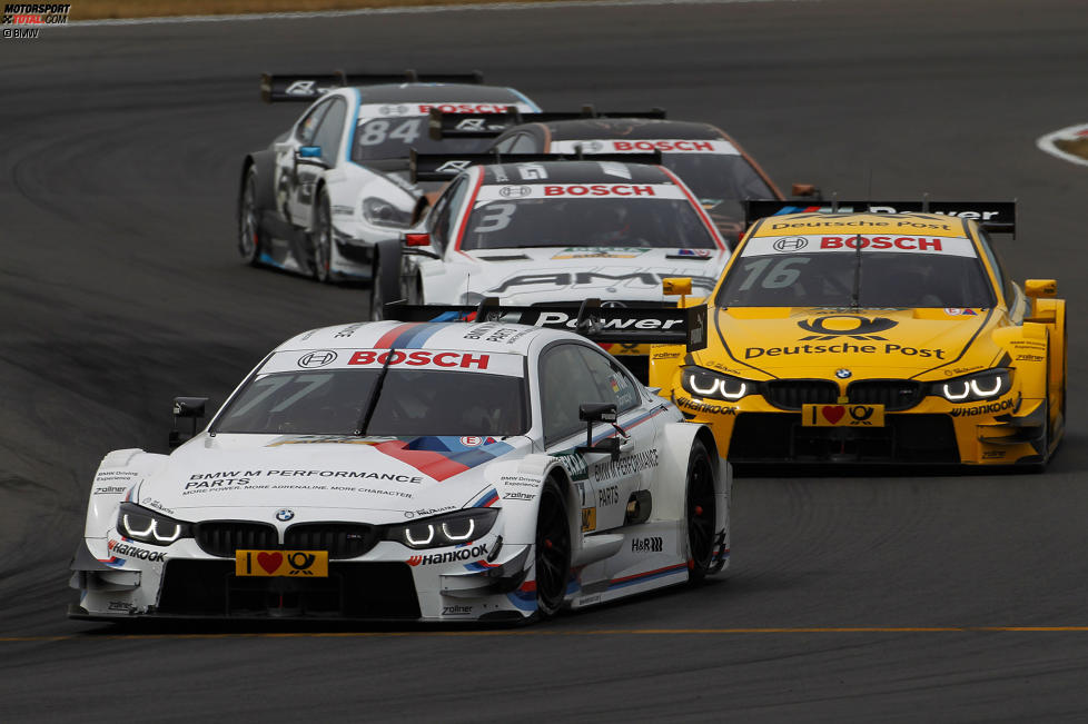 Martin Tomczyk (Schnitzer-BMW) und Timo Glock (MTEK-BMW) 