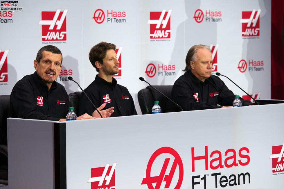 Teamchef Günther Steiner, Romain Grosjean und Teambesitzer Gene Haas