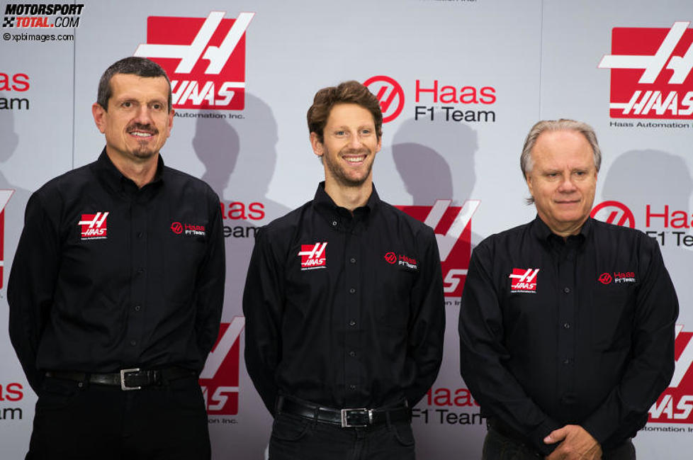 Teamchef Günther Steiner, Romain Grosjean und Teambesitzer Gene Haas