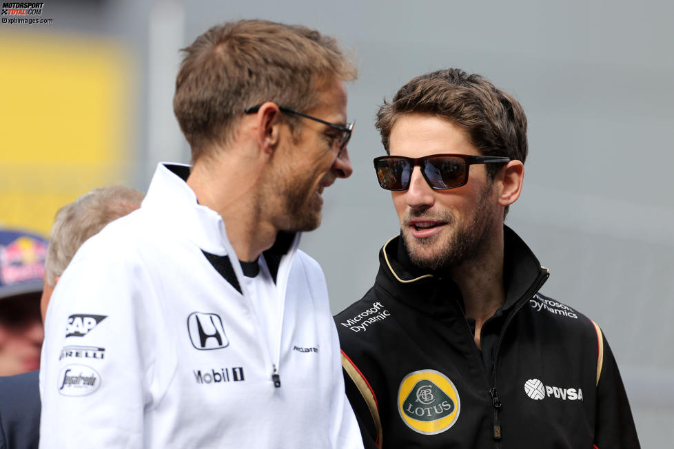 Romain Grosjean (Lotus) und Jenson Button (McLaren) 
