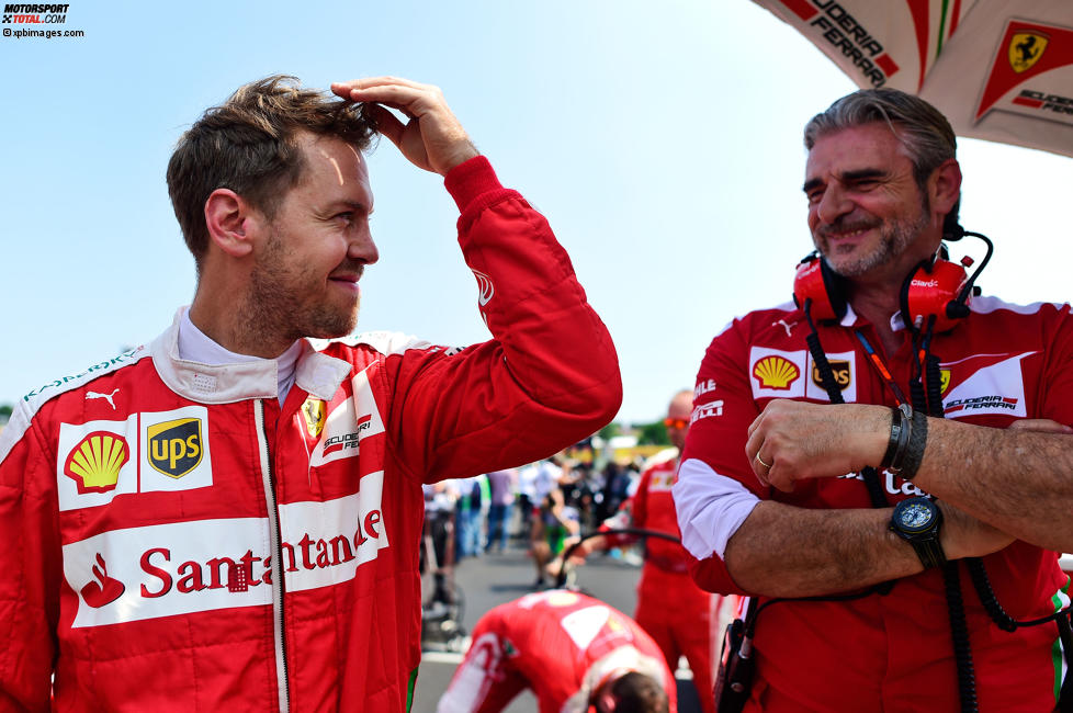 Sebastian Vettel (Ferrari) und Maurizio Arrivabene 