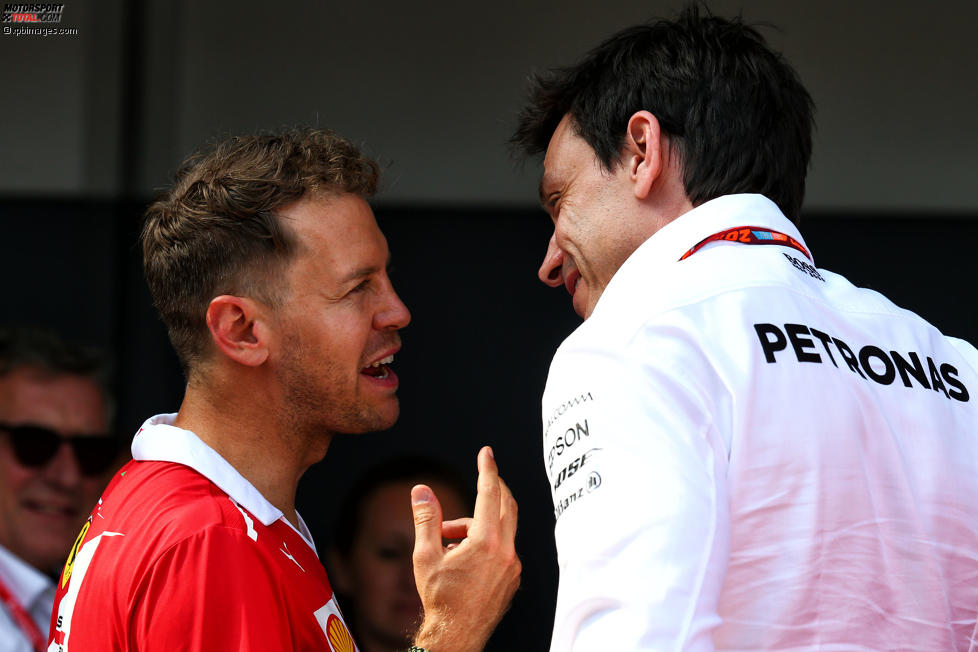 Sebastian Vettel (Ferrari) und Toto Wolff 