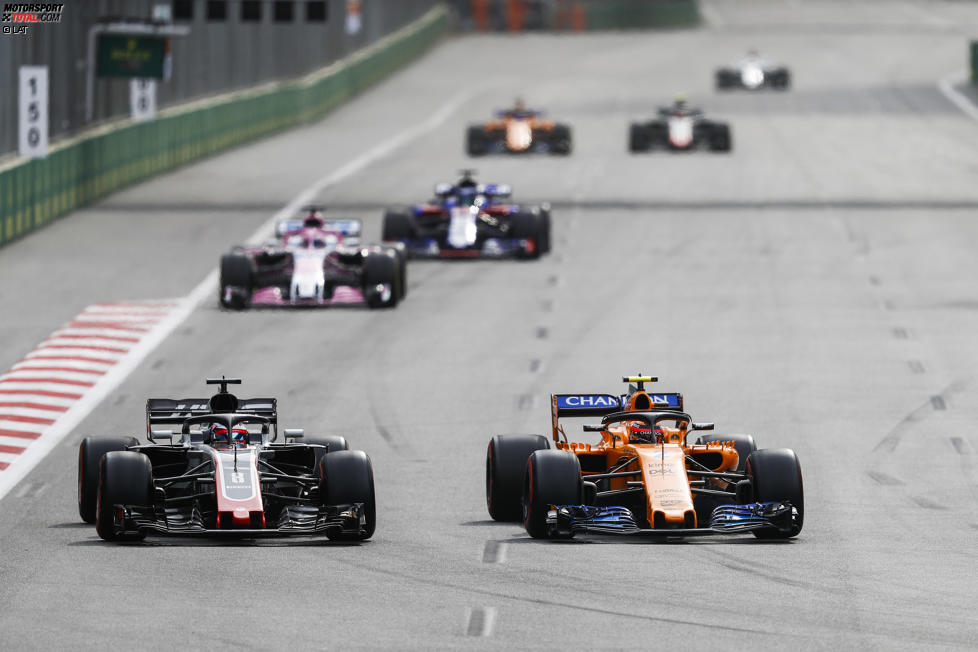 Stoffel Vandoorne (McLaren), Romain Grosjean (Haas) und Sergio Perez (Force India) 