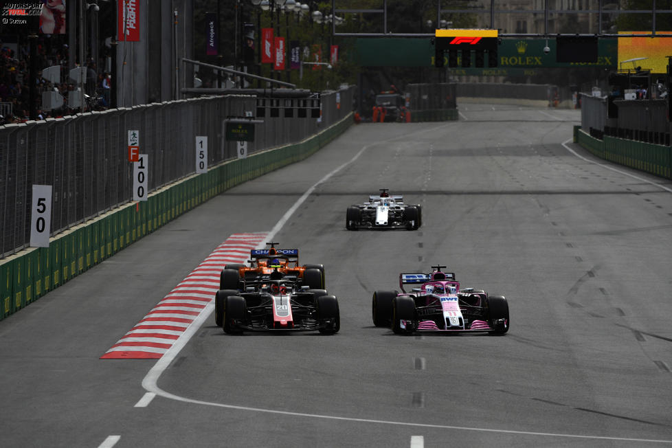 Kevin Magnussen (Haas) und Sergio Perez (Force India) 