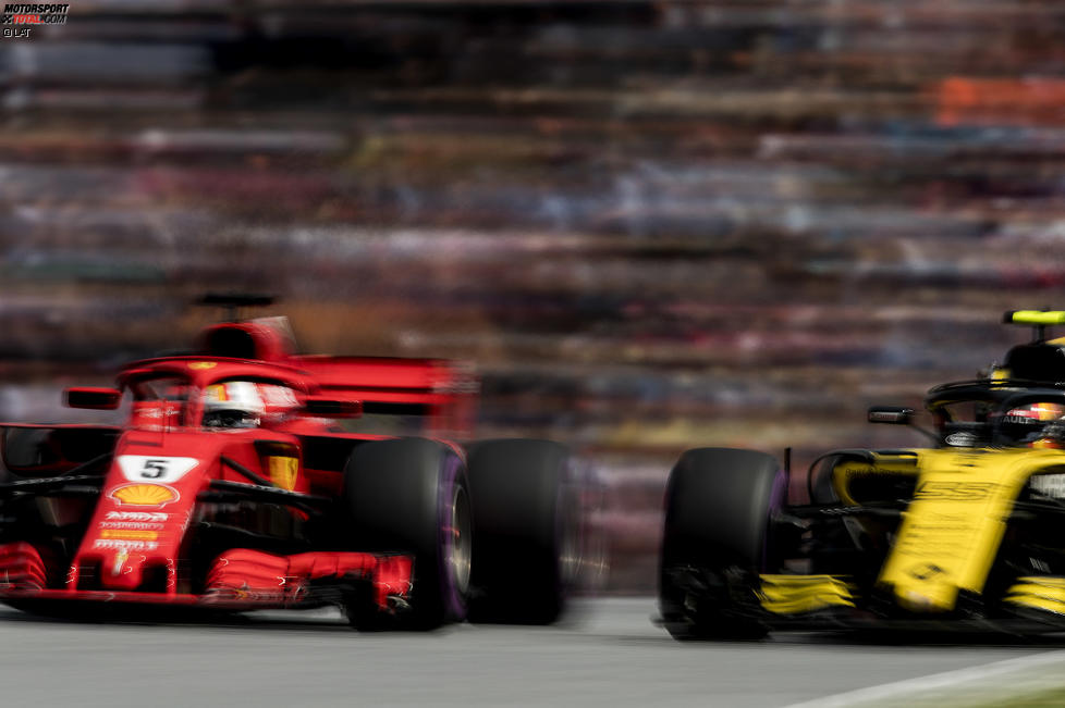 Sebastian Vettel (Ferrari) und Carlos Sainz (Renault) 