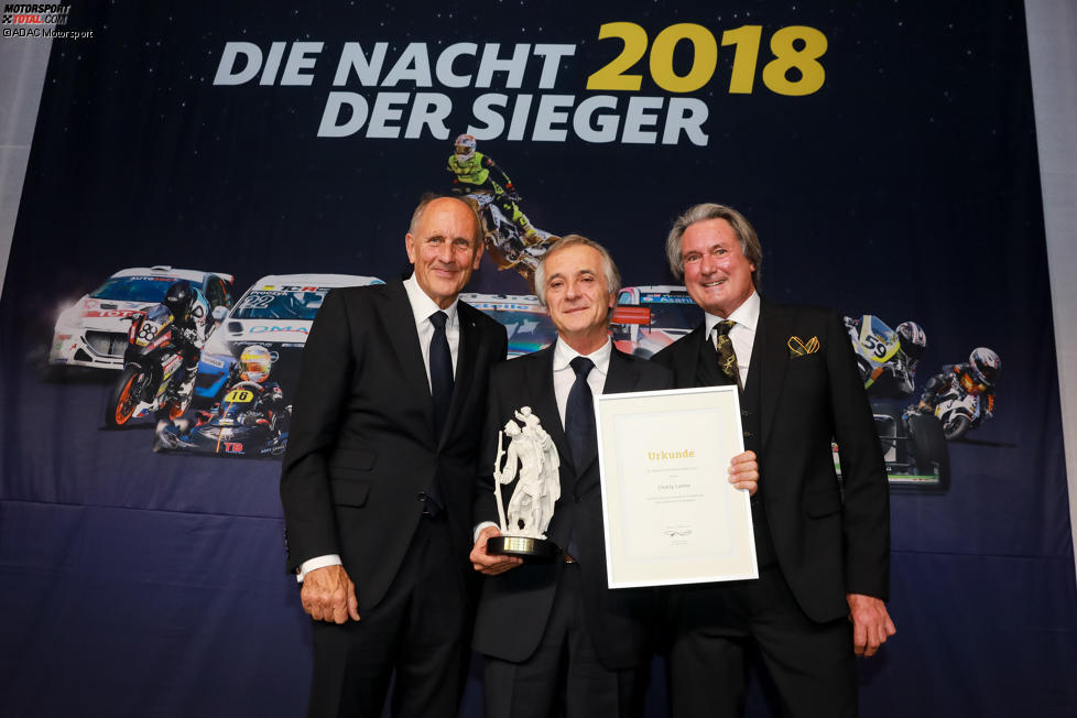 Hans-Joachim Stuck und Charly Lamm mit Hermann Tomczyk