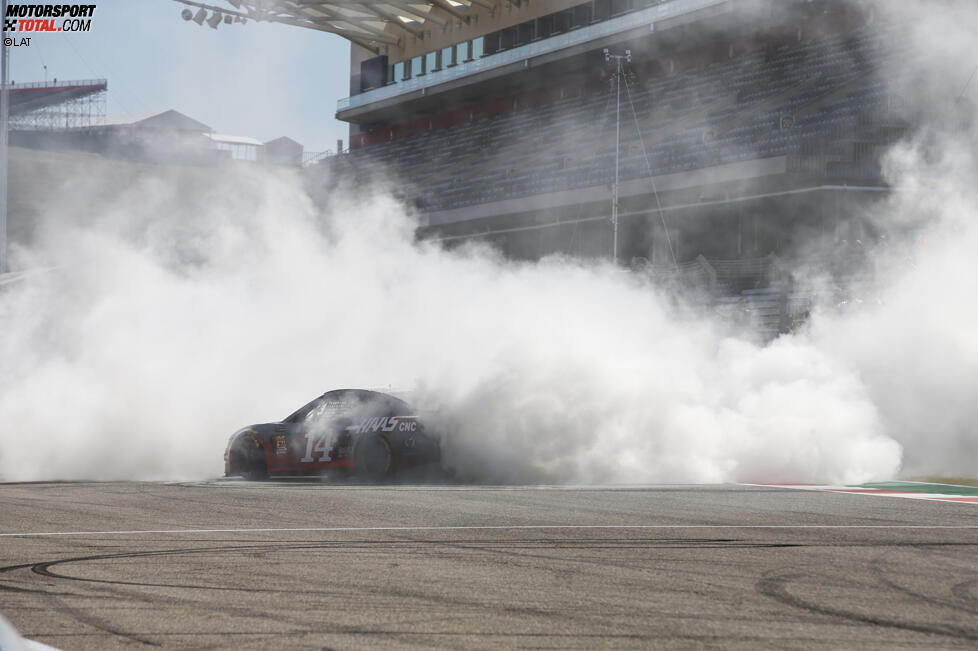 Kevin Magnussen (Haas), Romain Grosjean (Haas) und Tony Stewart 