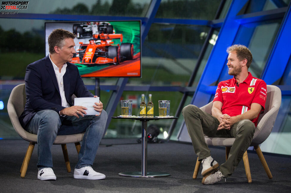 Andreas Gröbl (ServusTV) und Sebastian Vettel (Ferrari) 
