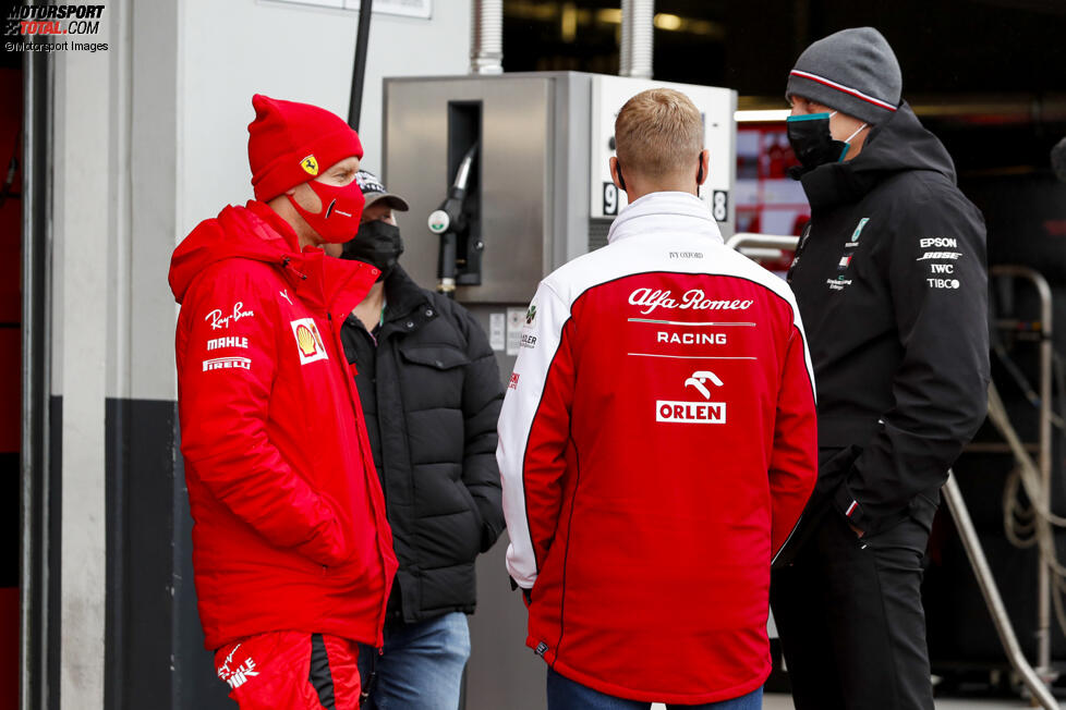 Sebastian Vettel (Ferrari), Mick Schumacher und Toto Wolff 